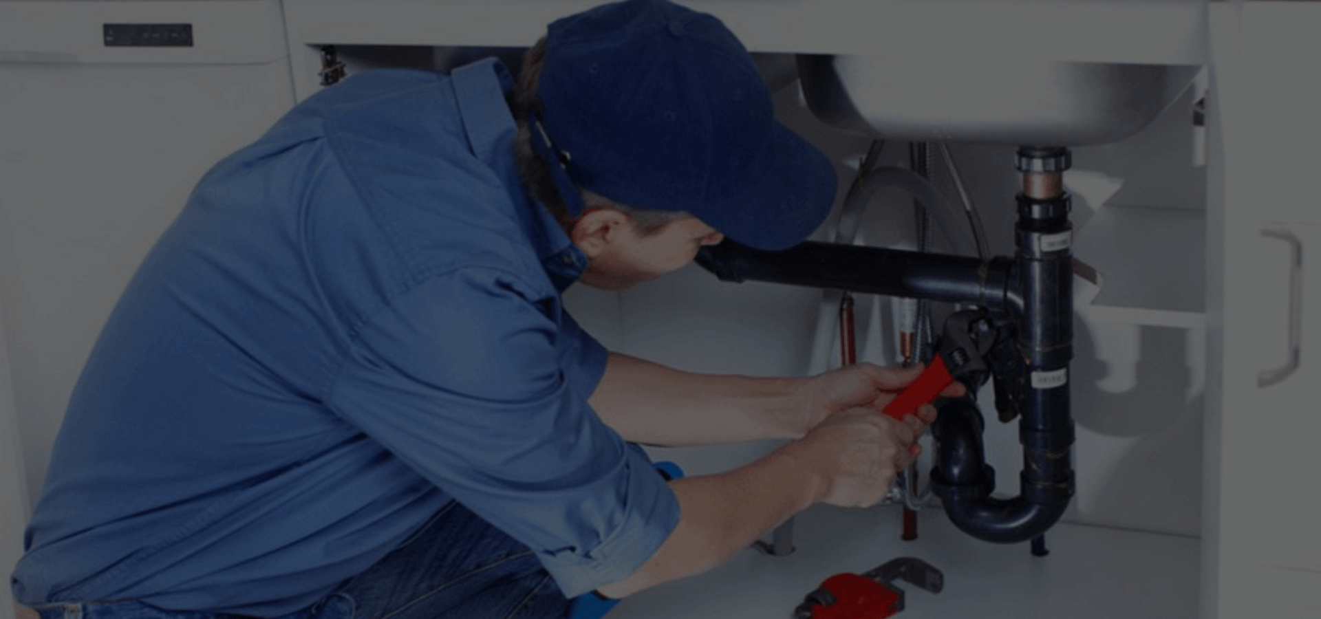 Emergency plumber fixing water leak under sink – Home Fixing Master