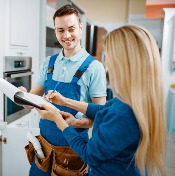 Licensed plumber answering customer questions about plumbing services